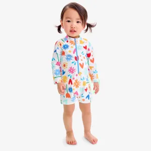 Baby one-piece rash guard in rainbow garden party