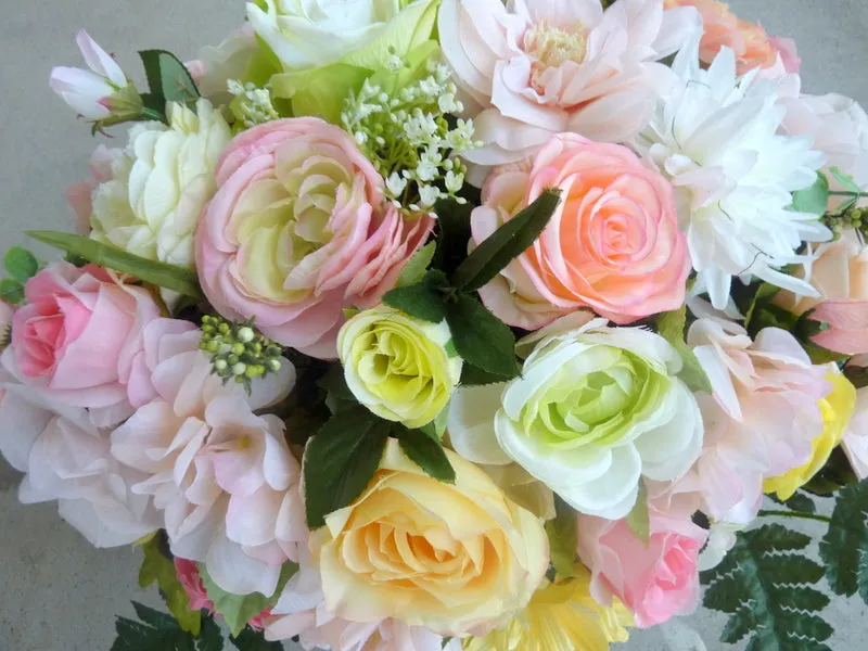 Cemetery flowers. Grave site spray, headstone saddle