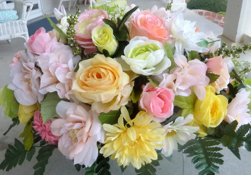 Cemetery flowers. Grave site spray, headstone saddle