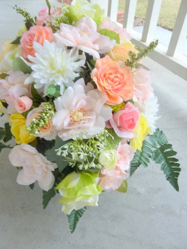 Cemetery flowers. Grave site spray, headstone saddle