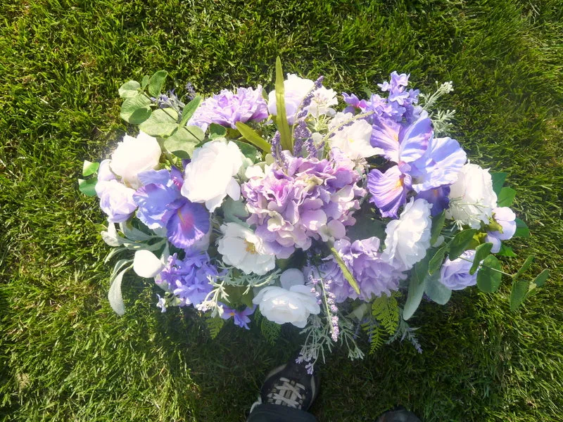 Grave site spray in Purple and white, memorial flowers, silk flower headstone saddle